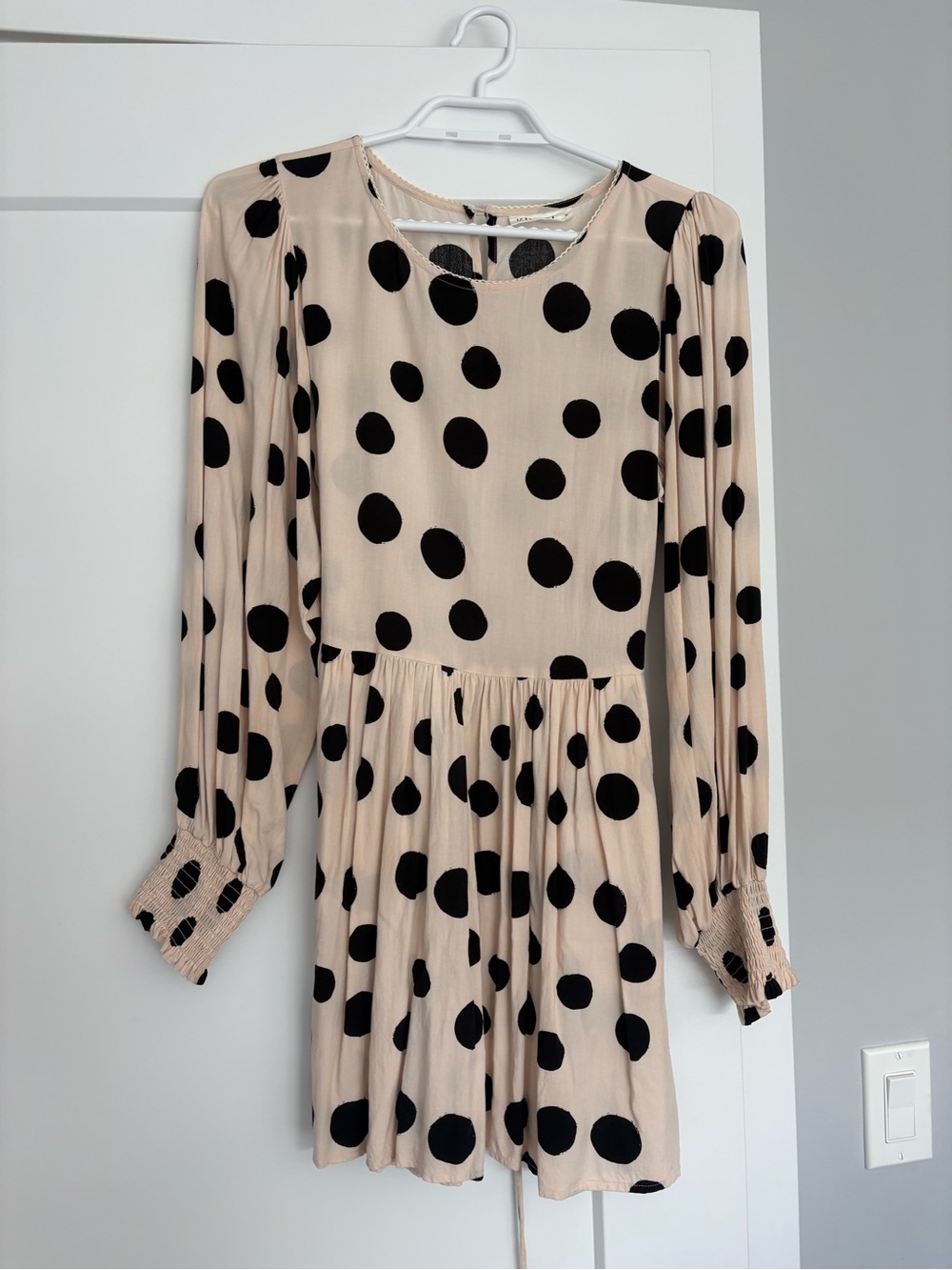 Kivari Beige Long Sleeve Polka Dot Mini Dress with Black Dots